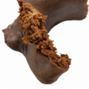Soft crumbly piece of Ketama Moroccan hash in deep brown, traditional imported hashish